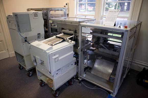Soon, you'll be able to print books found at the Internet Archive with this self-contained, fully automated book machine [http://www.ondemandbooks.com/].