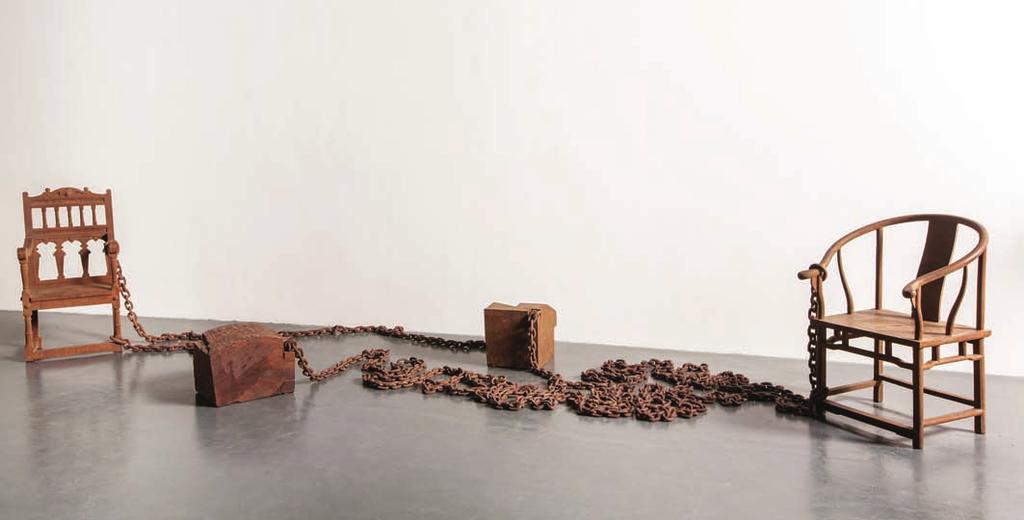 Ye Sen, Deconstructive Analysis 01-C, 2014, Wenge wood (Africa), steel, 167 x 101 x 34 cm, steel stand: 133 cm. Edition 3/4. Ye s art is without figures or faces to celebrate humanity.