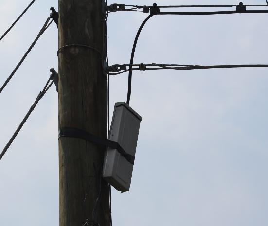 The picture below of Pole 10 on Elm Street, Stevensville in Queen Anne s County, MD shows a terminal taped shut and taped to a pole. The terminal should be secured to the pole.