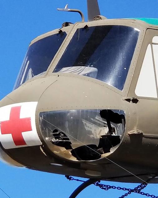 Four letters on the memorial wall were removed and one of the downward vision windows of the Huey helicopter mounted high above the wall was shattered.