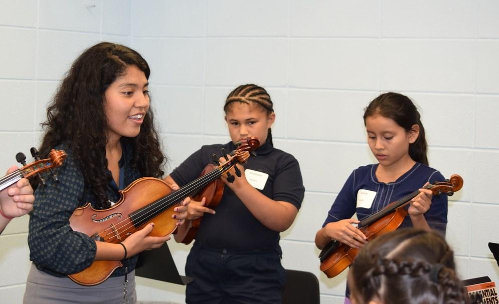 They start with musicianship and then move on to string instrumental instruction.
