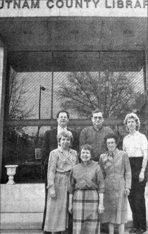 Living C4 In a clipping from the April 9, 1989 edition of the Herald Citizen, the library board members stand outside the current facility.