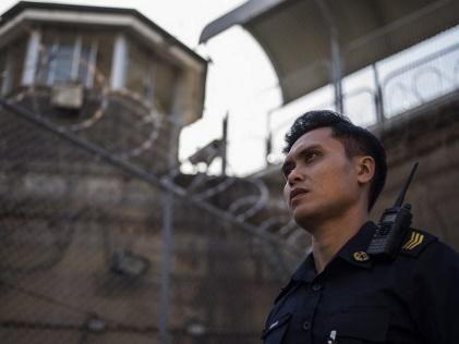 correctional officer, is recently transferred to Singapore's top prison.