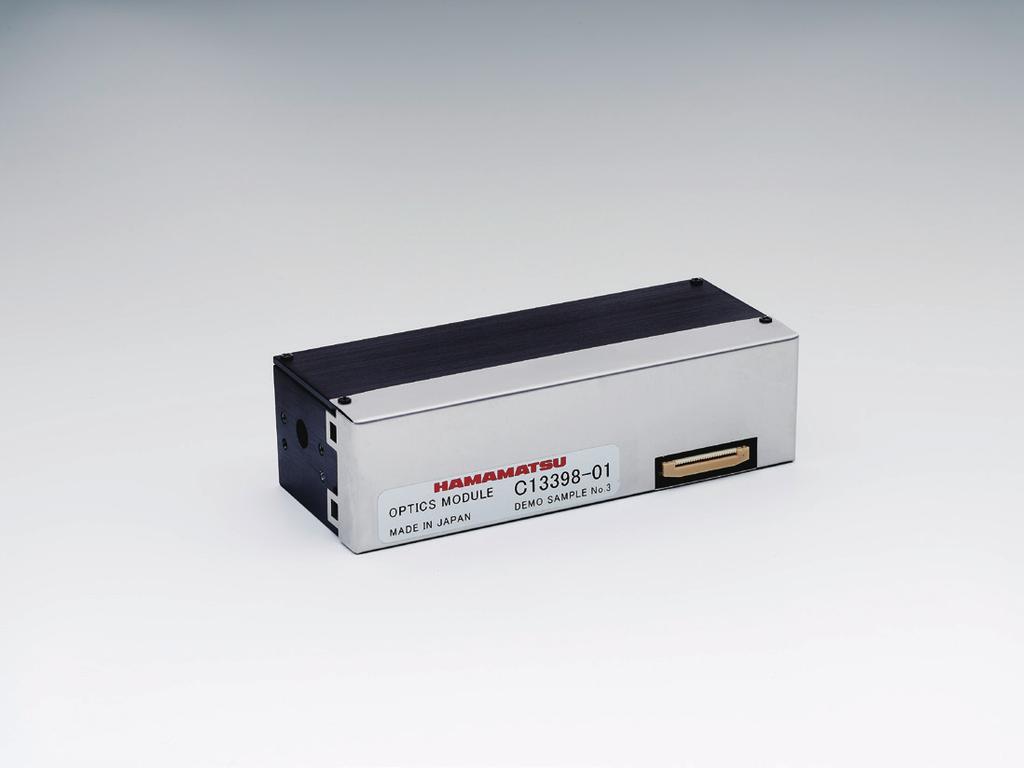 Absorbance measurement module with built-in photodiode array, optical elements, current-tovoltage converter, etc.