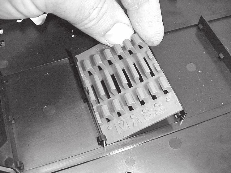 1 Install splice inserts into tray by placing the edge of the insert under tabs in nest on the tray.