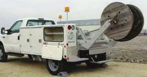 placing operations. The moving reel operation uses a bucket truck with a cable reel as the moving reel vehicle.