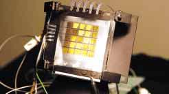 To construct such an ultrahighsensitivity compact camera, an advanced imaging device, called a "field emitter array image sensor with HARP target," was fabricated.