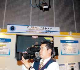 Technical Exhibits Millimeter-wave Mobile Camera - For stable, high-picturequality wireless transmission The use of wireless transmission within a studio would free program production from the knots