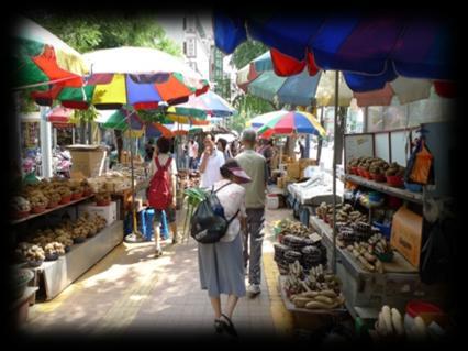 Chatting with friendly merchants heightens the attraction of a traditional market.