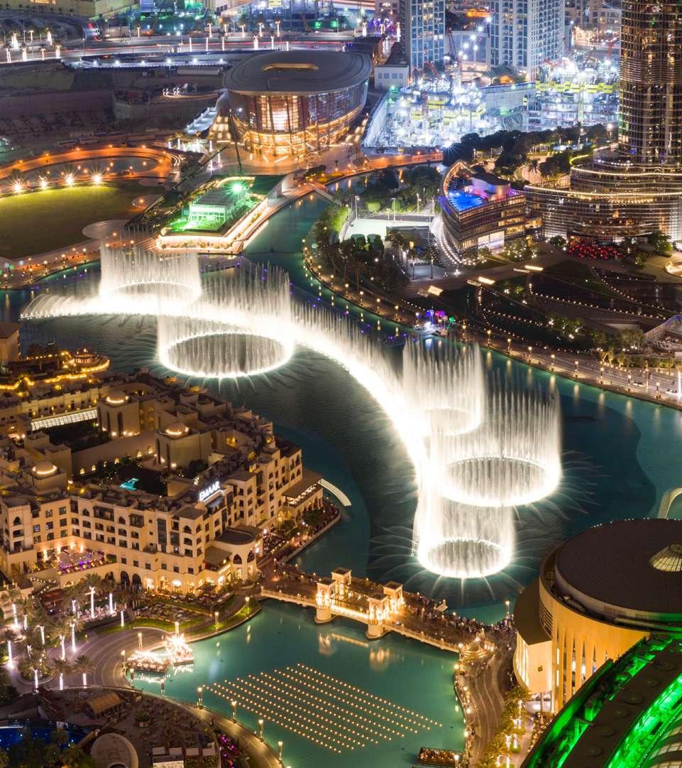 NEARBY LANDMARKS STELLAR VIEWS OF THE DUBAI FOUNTAIN Imagine over 22,000 gallons of water executing a choreographed dance to music, light and fire, spanning 275 metres across a lake in the shadow of
