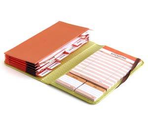 Page 3 of 12 Declutter Your Paper Piles On-the-Go Filing Invest in a tabbed wallet for receipts and coupons. It will make your purse into a mini filing cabinet (http://www.bhg.