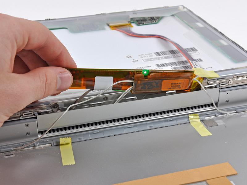 Once you can easily grab the board, pull it up enough to gain access to the inverter board's output connector.