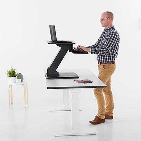 Quickshift Height adjustable standing desk that can be placed on top of your existing desk top n Small footprint n Gas assisted height