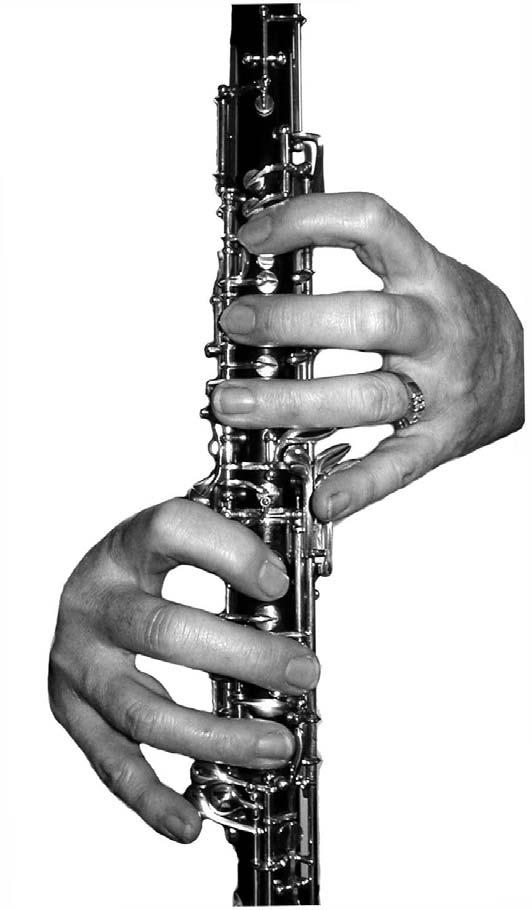 Oboe Hand Position Good Position This is a good hand position with the fingers over the keys and the first finger of the left hand is right over the second octave key.