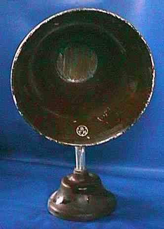 a telephone receiver and a phonographic horn was