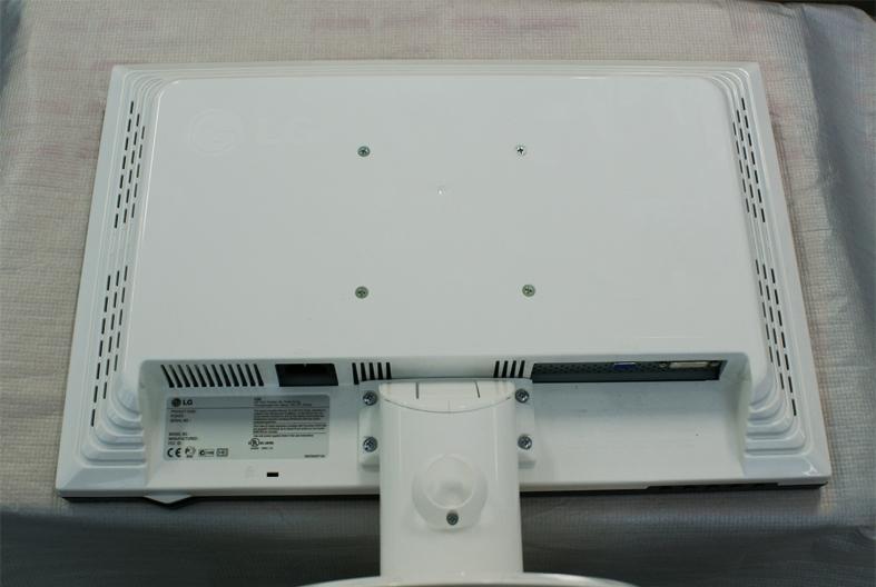 Installing the Wall mount plate This monitor satisfies the specifications of the Wall mount plate or the interchange device. 1. Place the monitor with its front facing downward on a soft cloth. 2.