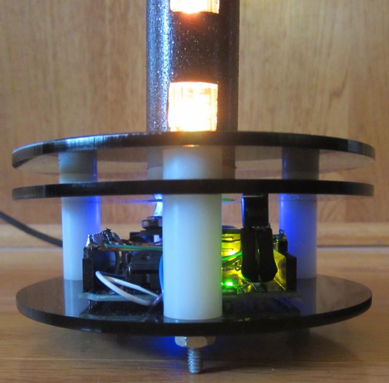 Photo Two LED Clock Base Detail Base made from three 4 smokey colored acrylic discs, some spacers and