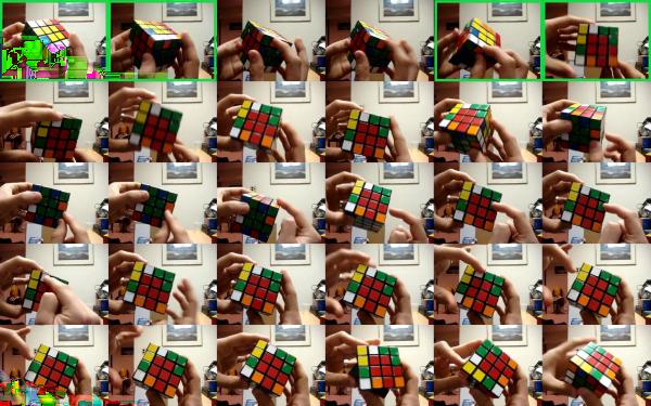 person is solving a rubik s cube GT: person