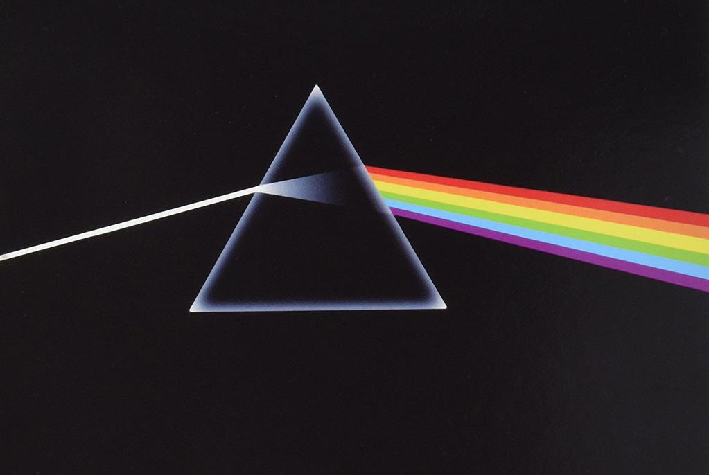 Then, from a source unknown, a beam of light shoots in from the left, hitting the triangle at such a precise upward angle that Design: Hipgnosis it miraculously travels through it, spilling out the