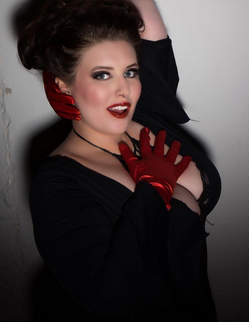 Rosy Outlook This Minnesota show girl has a love for spectacle and sparkle. A costumer, dancer and plus size model, Deeva Rose has taken the Twin Cities by storm.