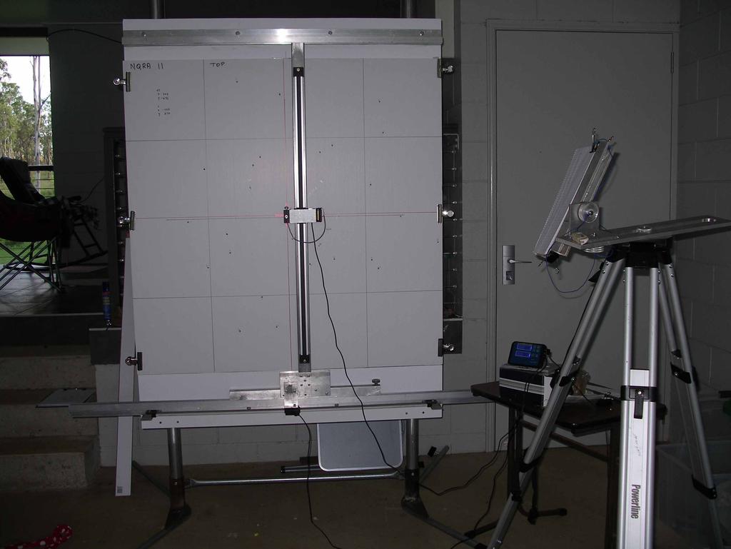 At the conclusion of the tests the Corflute sheets were stripped from the targets and the location of each hole measured on a purpose built machine using two