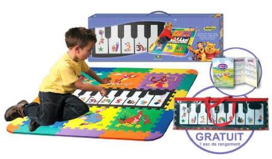 Foam puzzle mat with integrated giant piano keyboard. Well-known cartoon figures on the keys, the puzzle mat pieces and the packaging.