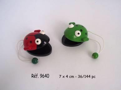 Wooden castanets, 7cm x 4 cm. The castanets are presented as a ladybird and a frog, respectively, with simplified friendly features.