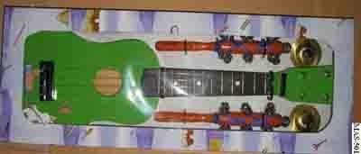 Scaled down versions; the "real" musical instrument has no childappealing colours and usually 6 or more strings which can be tuned. Wooden guitars with 4 strings, frets and brightly coloured bodies.