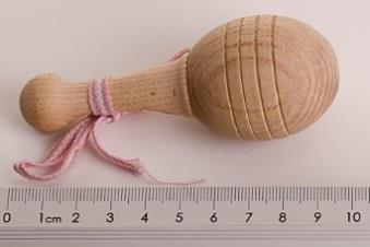 Rattle (in the shape of maracas) for children too young to sit up.