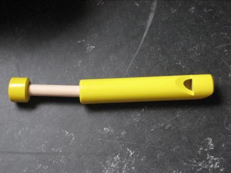 Musical quality is not the objective. 8124-8 Table 4. Simple, bright yellow wooden flute.
