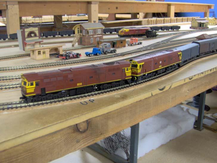 The Curtains have been completed around the layout, helping to give the layout a finished look. Neil Sorenson is continuing his fine work on the O scale scenery.