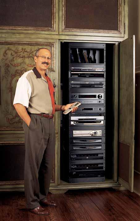 FAMILY AT PLAY Home systems installer Gordon Van Zuiden of cybermanor in Los Gatos, CA, stored Cindie and Terry McMahon s entertainment gear in one convenient location.
