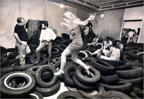 Allan Kaprow, American painter and performance artist, coined this term in 1957 to
