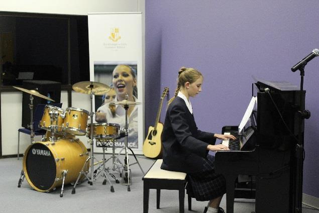 The piano ensemble started the concert with their debut performance, showcasing the product of their rehearsals through